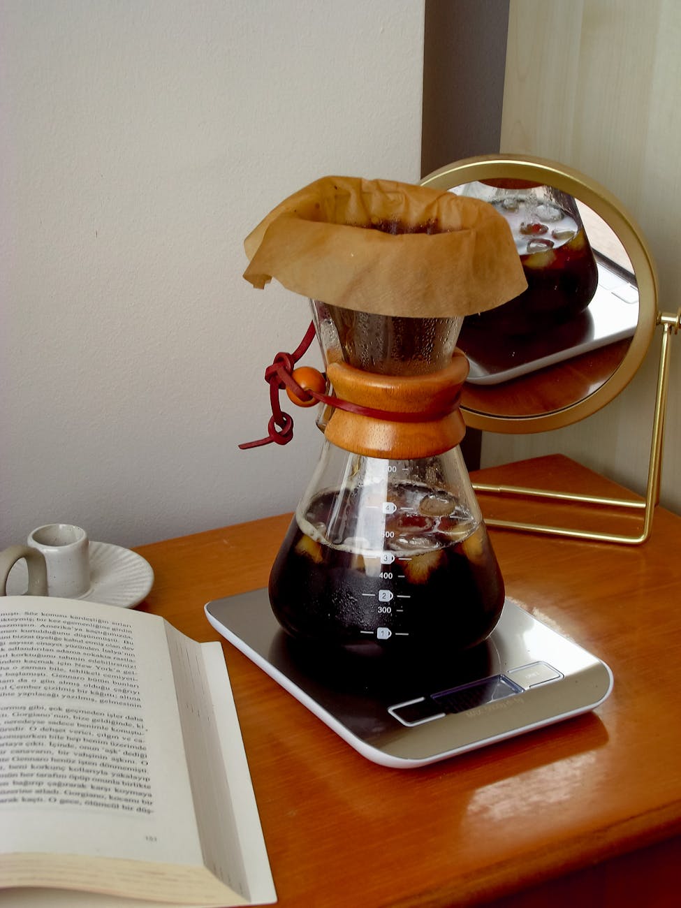 A curated collection of the top-rated premium coffee scales displayed neatly on a wooden table, each with a small tag indicating its category (e.g., 'Best Overall', 'Best for Espresso'), warm, inviting home brew setting, high resolution