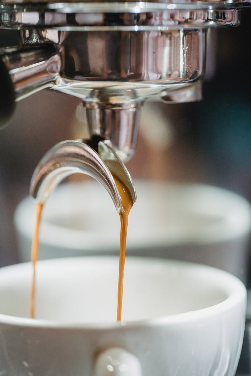 Three espresso shots in clear glasses, side-by-side. One gushing (under-extracted, light brown, thin crema), one perfect (medium brown, thick crema, flowing like honey), and one choking (over-extracted, very dark, sparse crema, barely flowing). Labels clearly indicate each type of extraction.